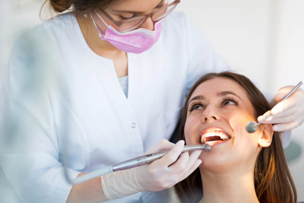 How-To-Prevent-Tooth-Decay a woman sees her general dentist to prevent tooth decay