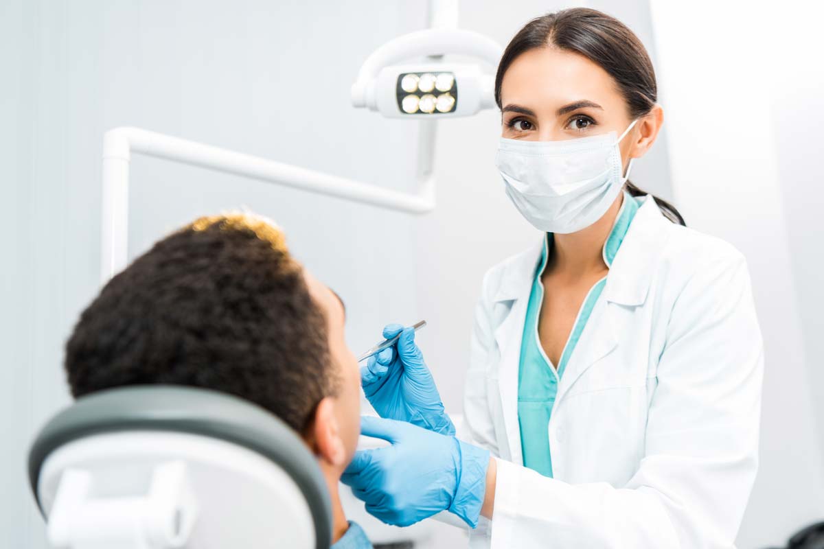 dentist performing general dentistry services