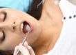 a woman needs emergency dental services