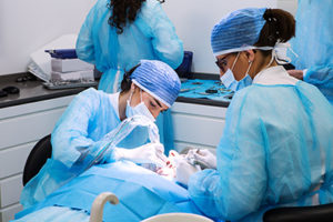 dentists performing oral surgery