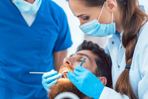 man getting Dental Health Services in texas