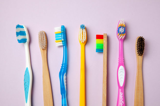 line up of different Types of Toothbrushes