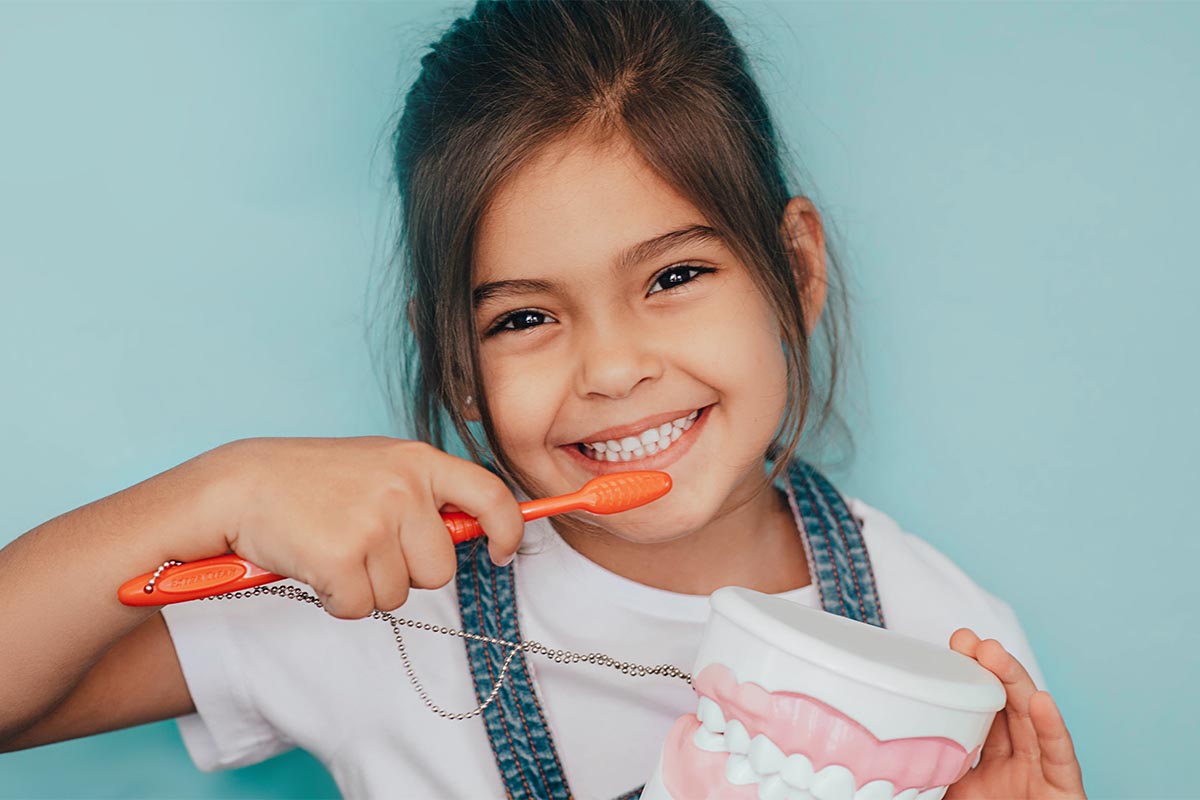 child participates in pediatric dentistry