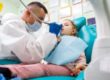 a man applies braces for kids